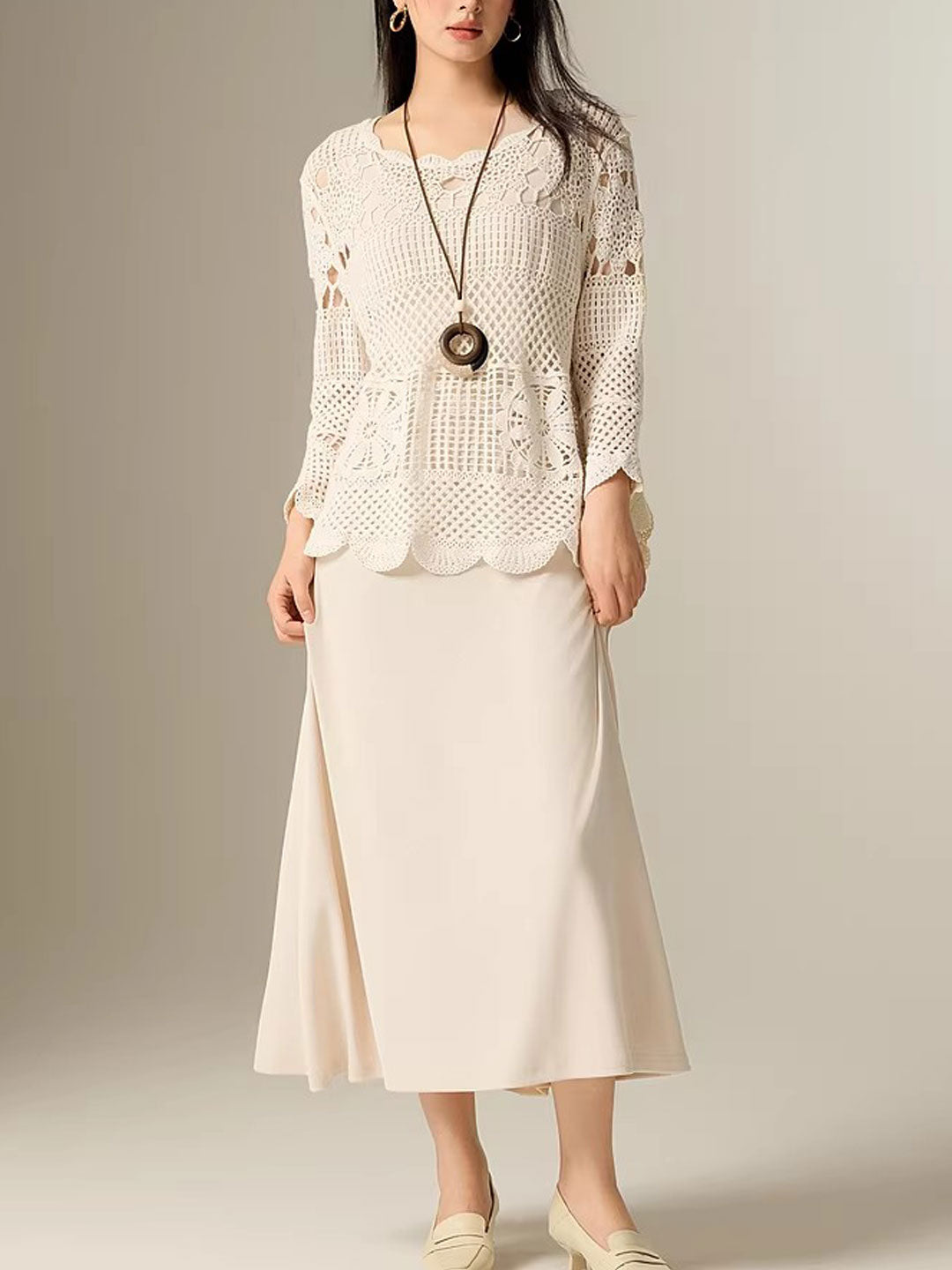 Evelyn Loose V-Neck Hollowed Top